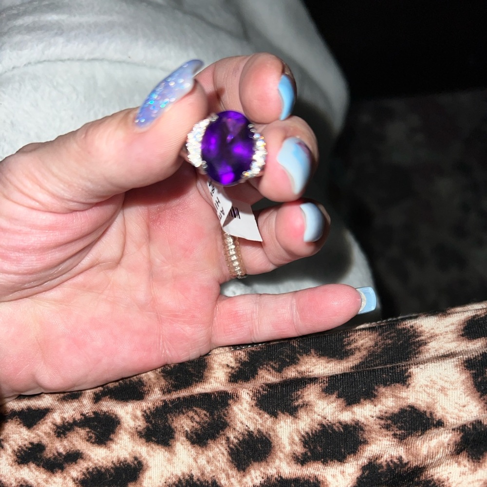 Genuine amethyst and topaz set in .925 Sterling size 7